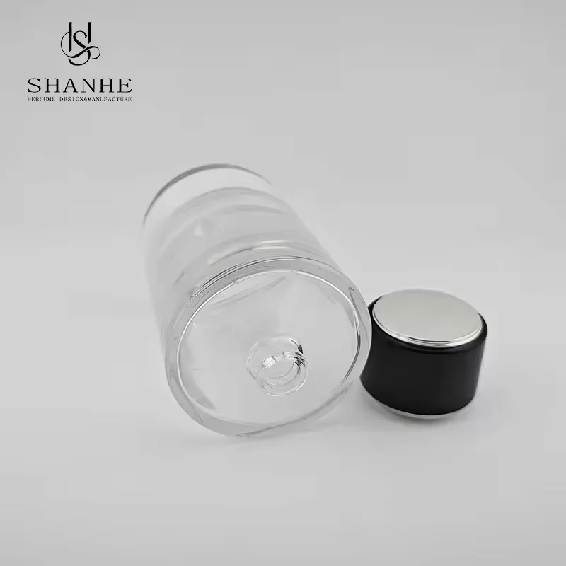 Clear Cylindrical Glass Perfume Bottle